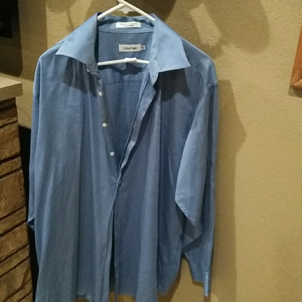 Man shirt size is 16 1/2